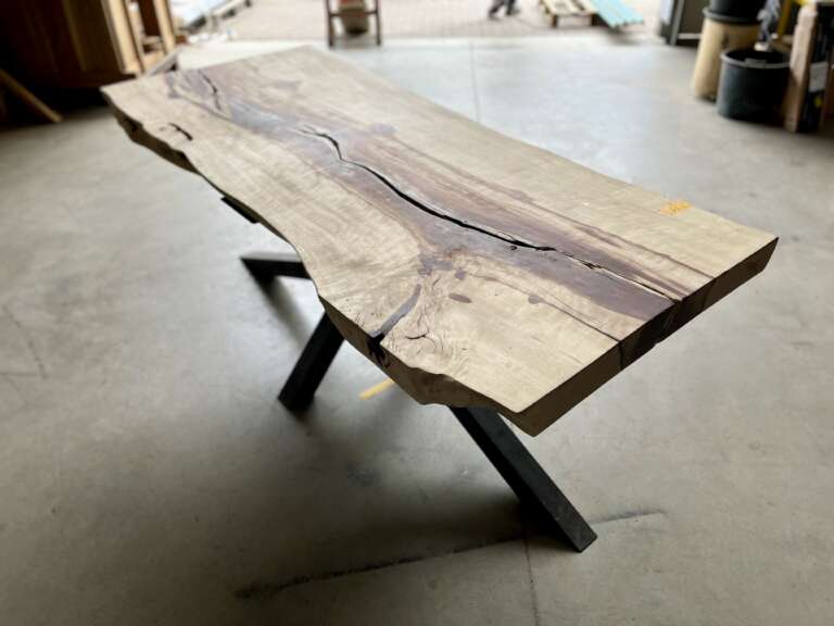 Table en palissandre massif avec piétement Pall design contemporain